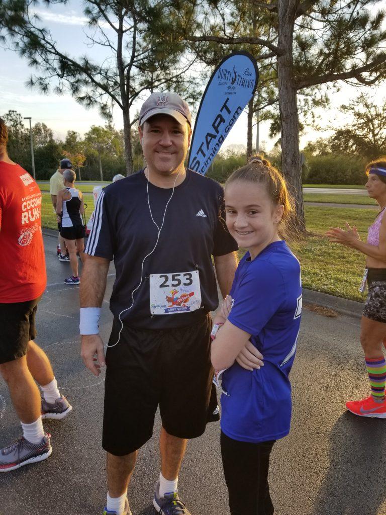 True competitors: Luke and his daughter at the start of the Turkey Trot